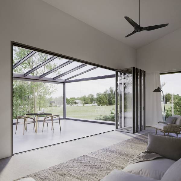 L'entourage est totalement vitré pour un maximum de lumière. Véranda et baie accordéon en aluminium.