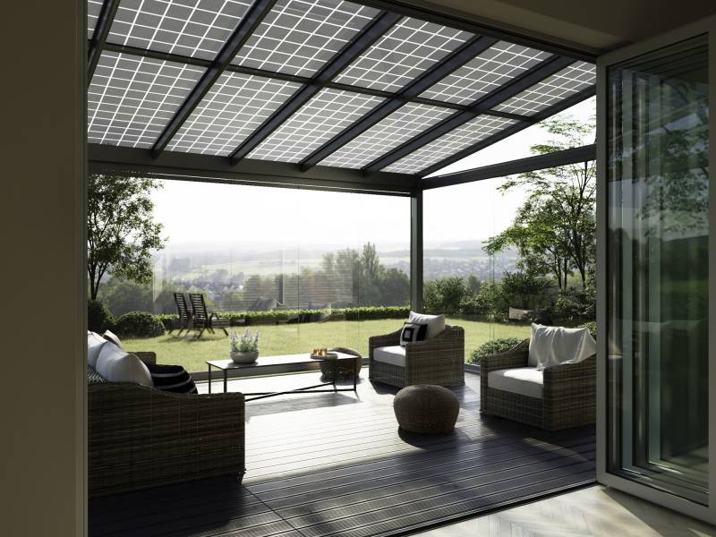 Mise en place d'une véranda en aluminium Solarlux par L'Ouverture Française.